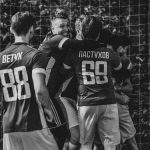grayscale photography of 2 men in jersey shirt